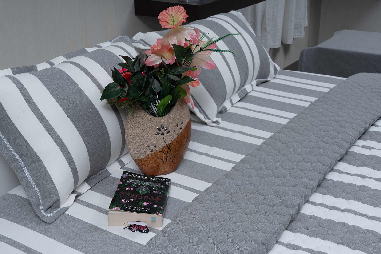 Linn Decors pillow covers set styled on a bed with coordinated bedding in a modern bedroom