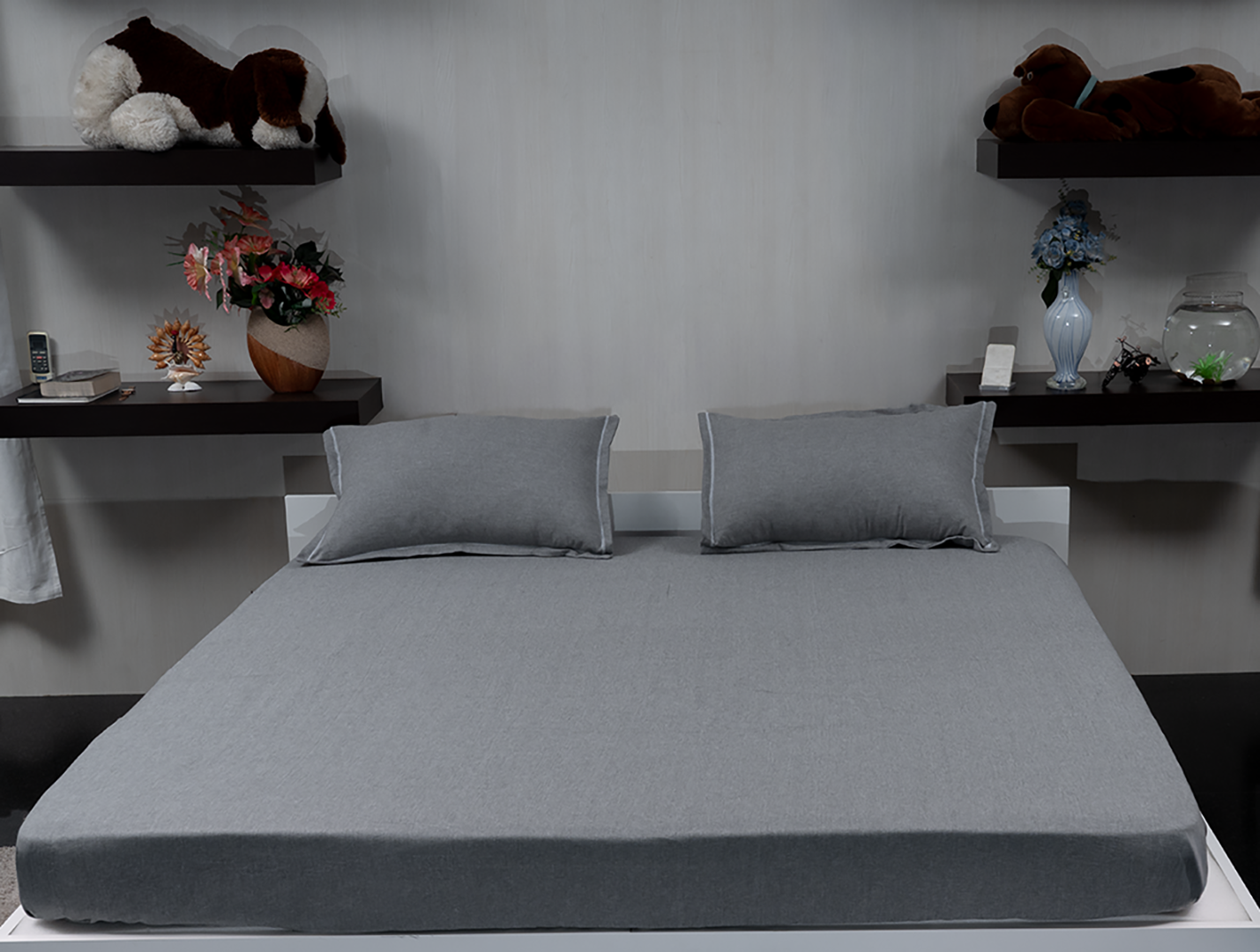 Linn Decors fitted sheet with two pillow covers and duvet cover styled on a modern bedroom bed