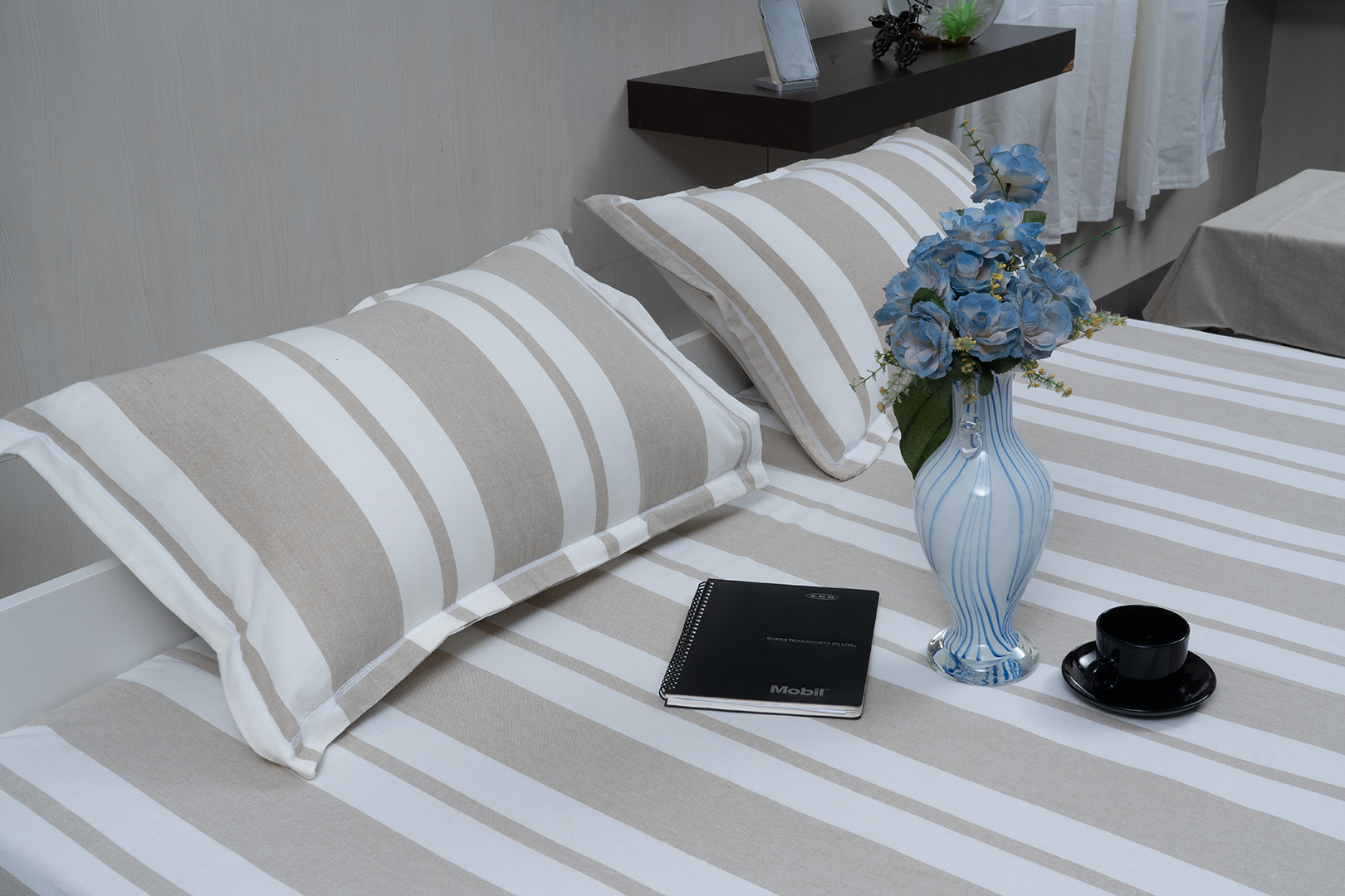 Linn Decors fitted sheet with two pillow covers and duvet cover styled on a modern bedroom bed