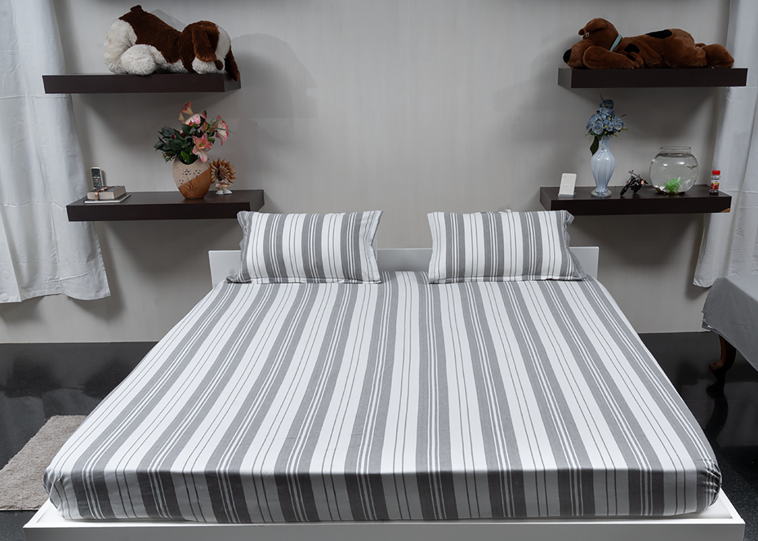 Linn Decors fitted sheet with two pillow covers and duvet cover styled on a modern bedroom bed
