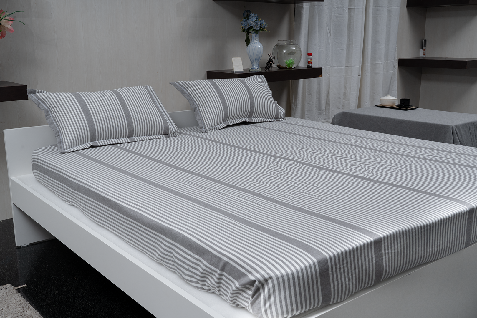 Linn Decors fitted sheet with two pillow covers and duvet cover styled on a modern bedroom bed