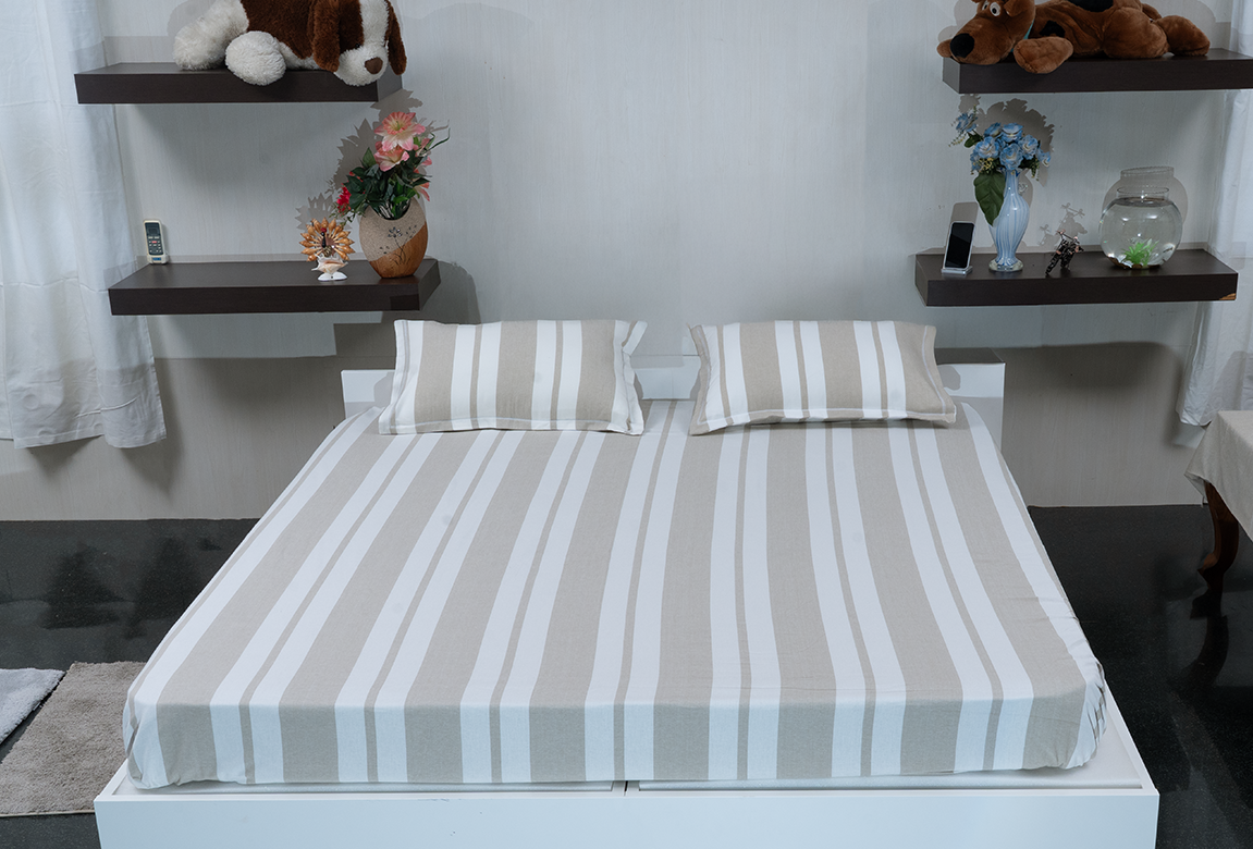 Linn Decors fitted sheet with two pillow covers and duvet cover styled on a modern bedroom bed