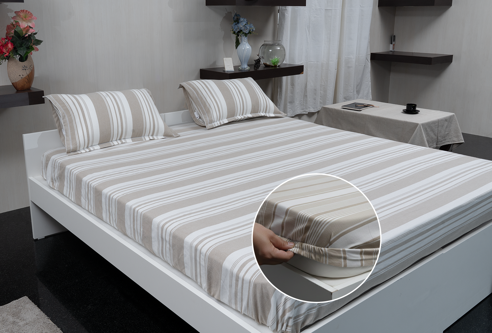 Linn Decors fitted sheet with elastic edges on a modern bed in a clean bedroom setting