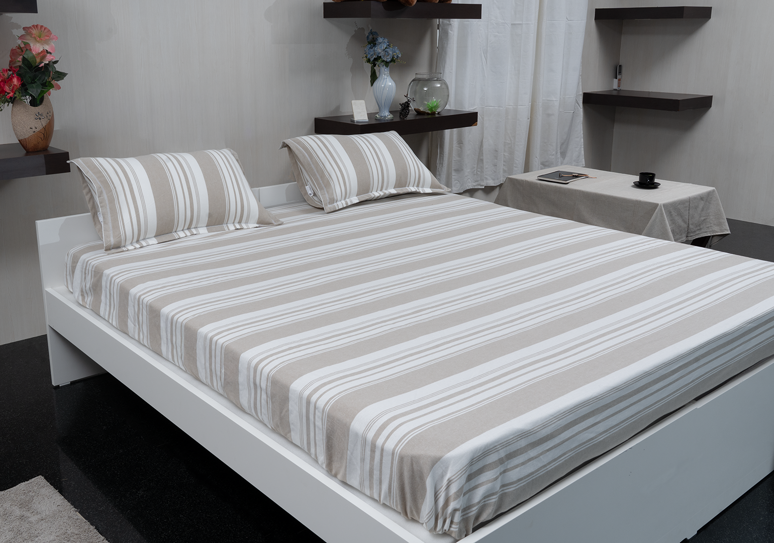 Linn Decors fitted sheet with two pillow covers and duvet cover styled on a modern bedroom bed