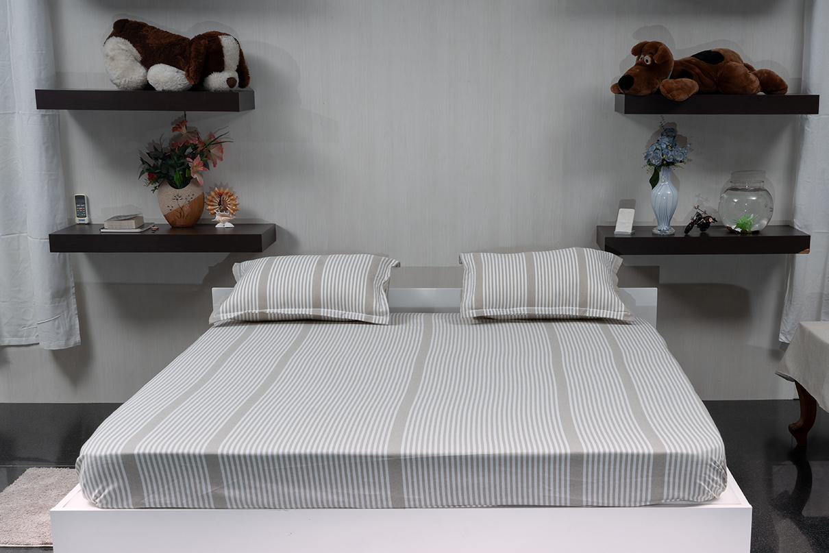 Linn Decors fitted sheet with two pillow covers and duvet cover styled on a modern bedroom bed