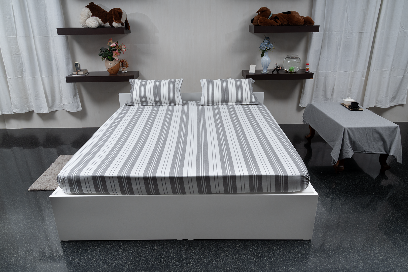 Linn Decors fitted sheet with two pillow covers and duvet cover styled on a modern bedroom bed