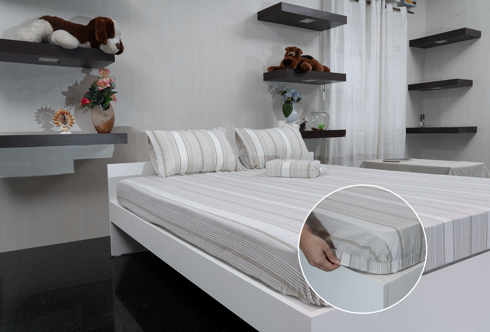 Linn Decors fitted sheet with elastic edges on a modern bed in a clean bedroom setting