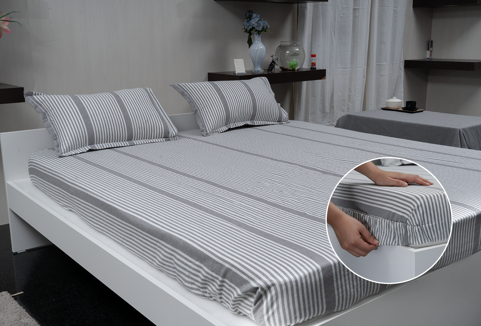 Linn Decors fitted sheet with elastic edges on a modern bed in a clean bedroom setting