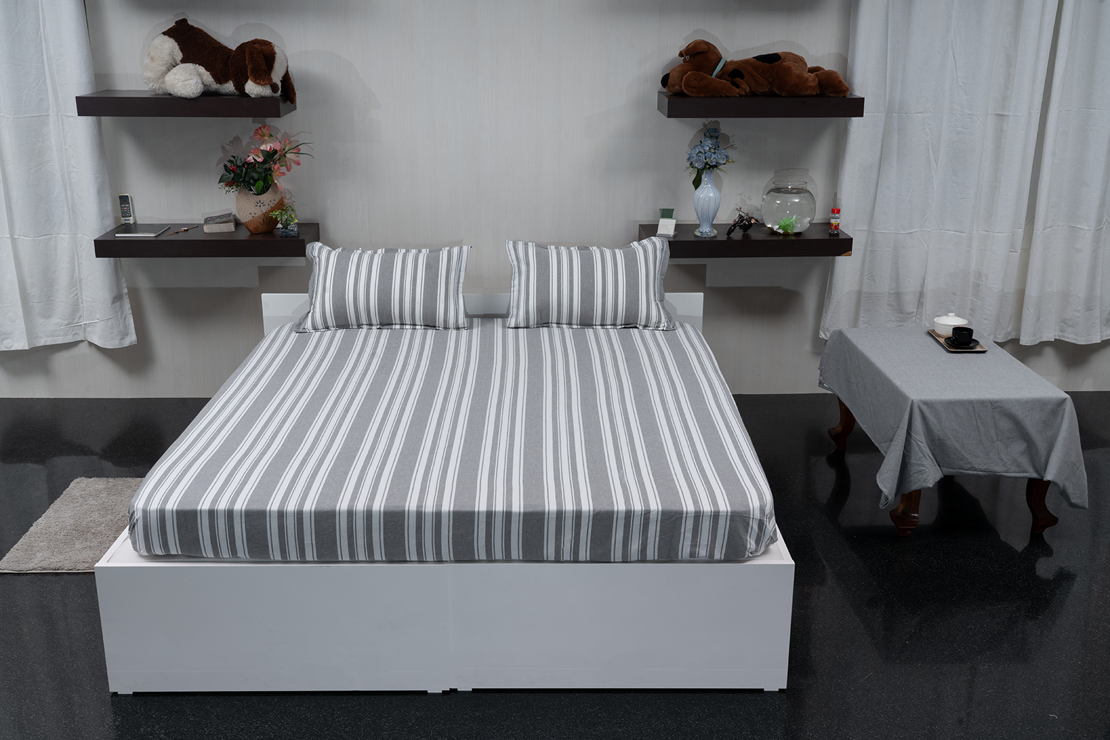 Linn Decors fitted sheet with two pillow covers and duvet cover styled on a modern bedroom bed