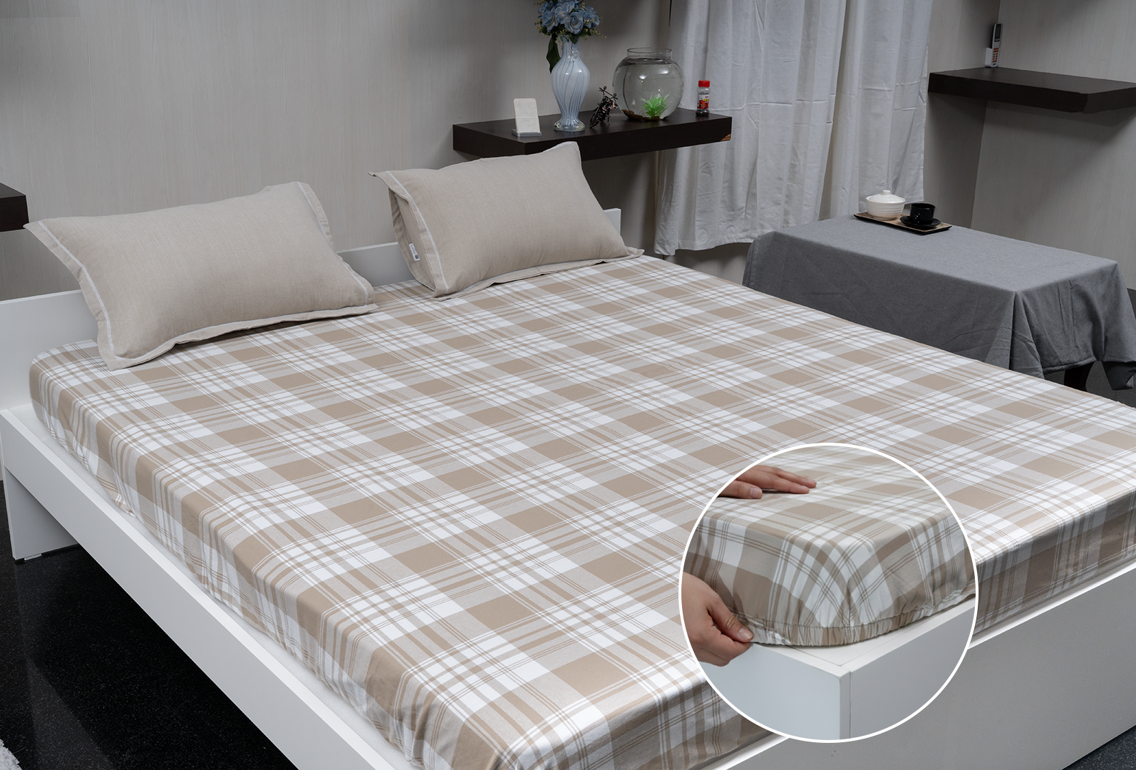 Linn Decors fitted sheet with elastic edges on a modern bed in a clean bedroom setting
