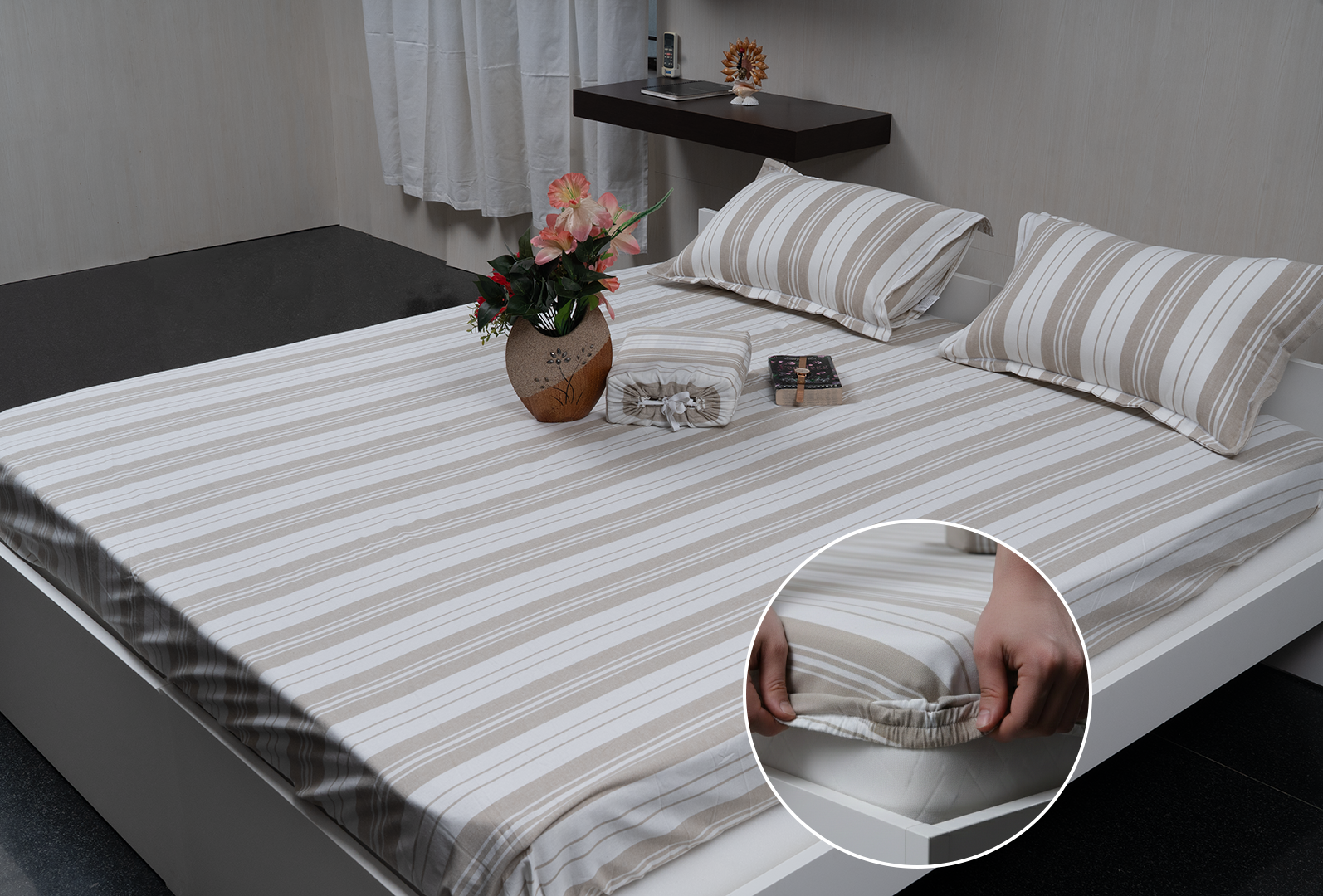 Linn Decors fitted sheet with elastic edges on a modern bed in a clean bedroom setting