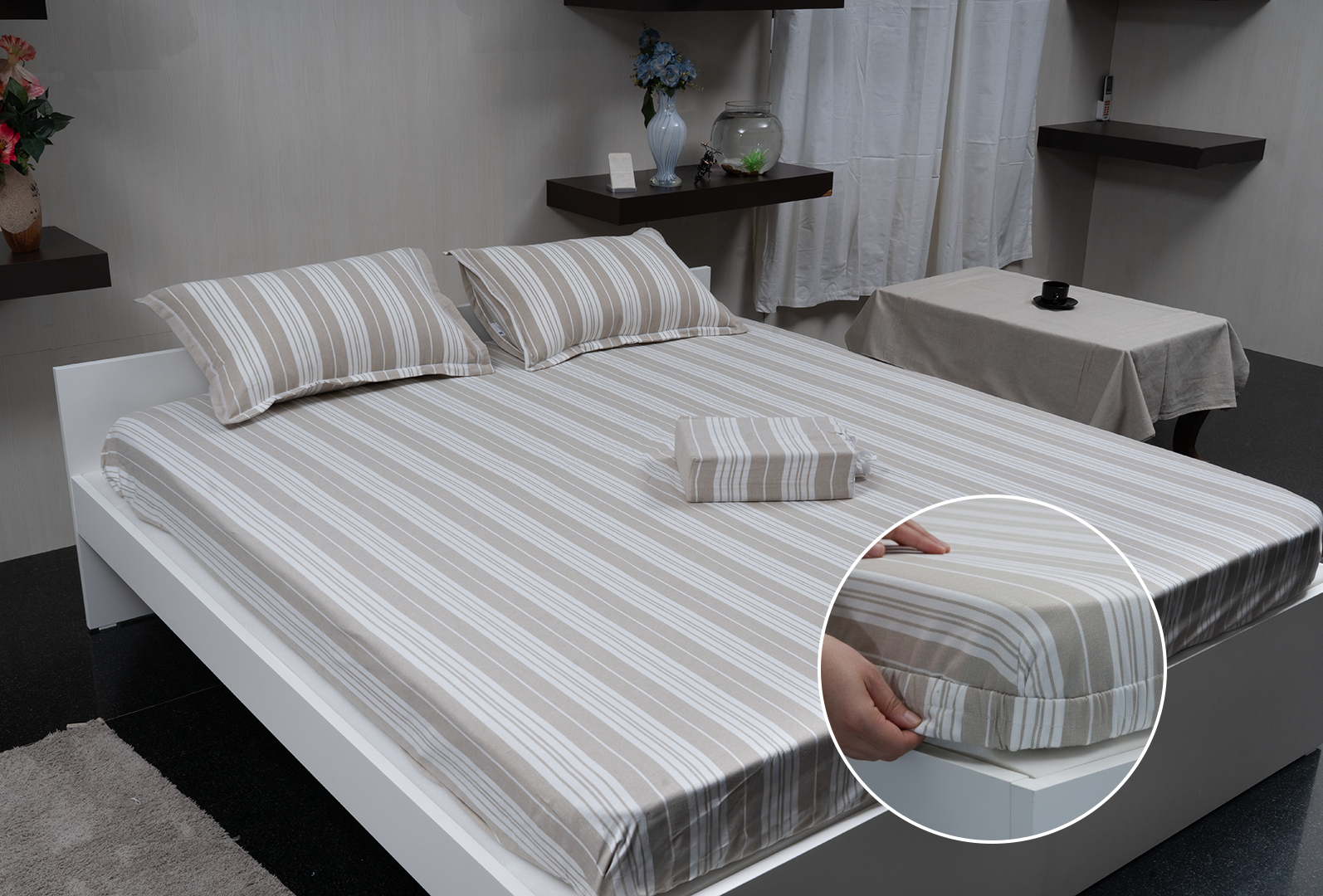 Linn Decors fitted sheet with elastic edges on a modern bed in a clean bedroom setting