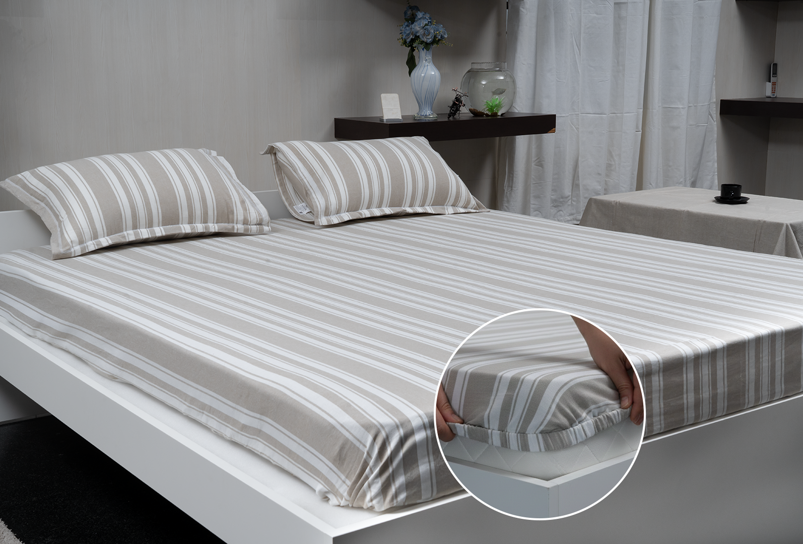 Linn Decors fitted sheet with elastic edges on a modern bed in a clean bedroom setting