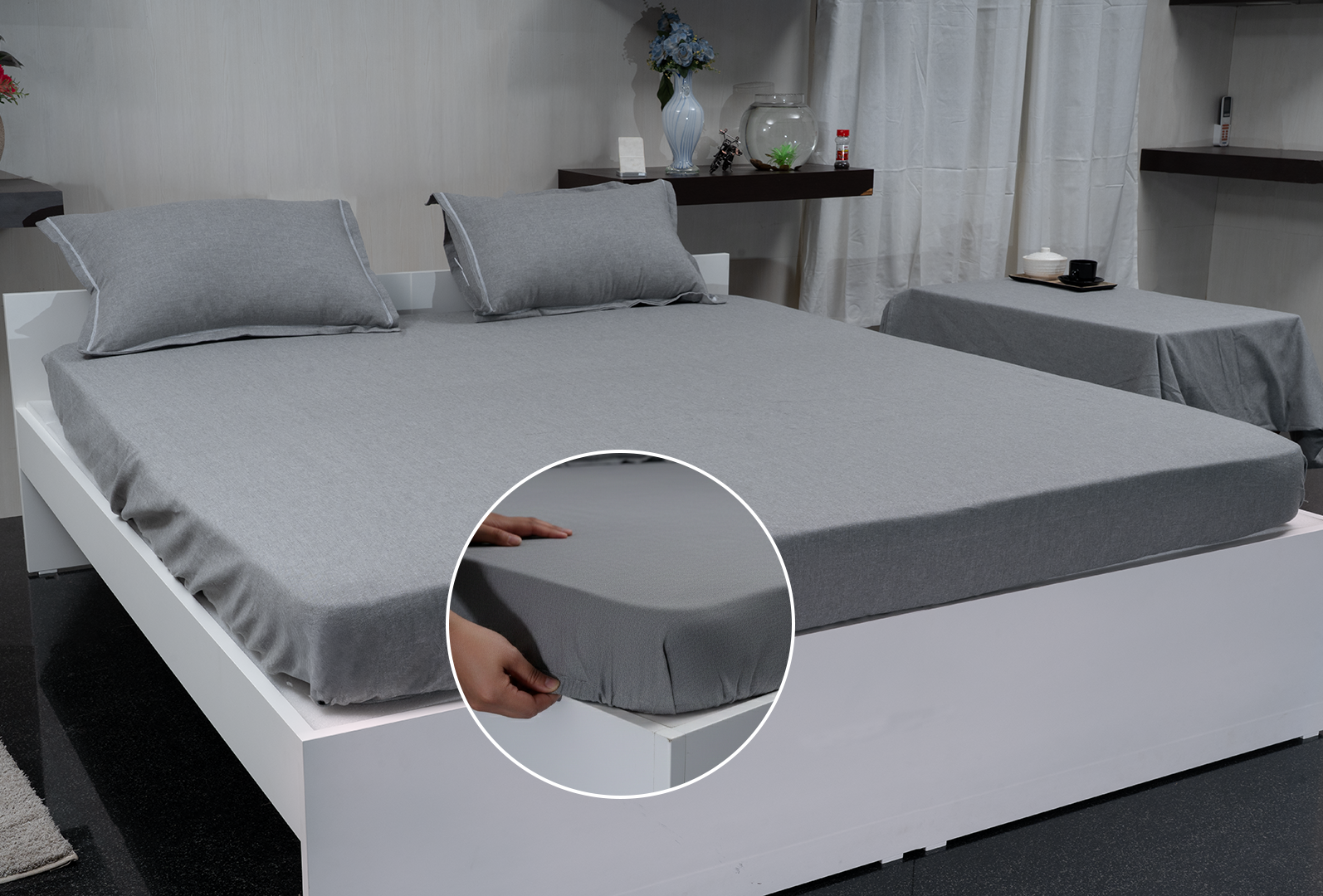 Linn Decors fitted sheet with elastic edges on a modern bed in a clean bedroom setting