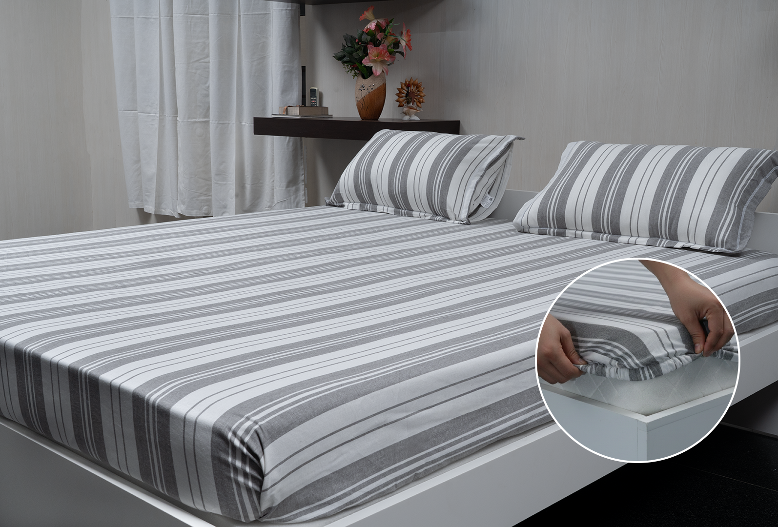 Linn Decors fitted sheet with elastic edges on a modern bed in a clean bedroom setting