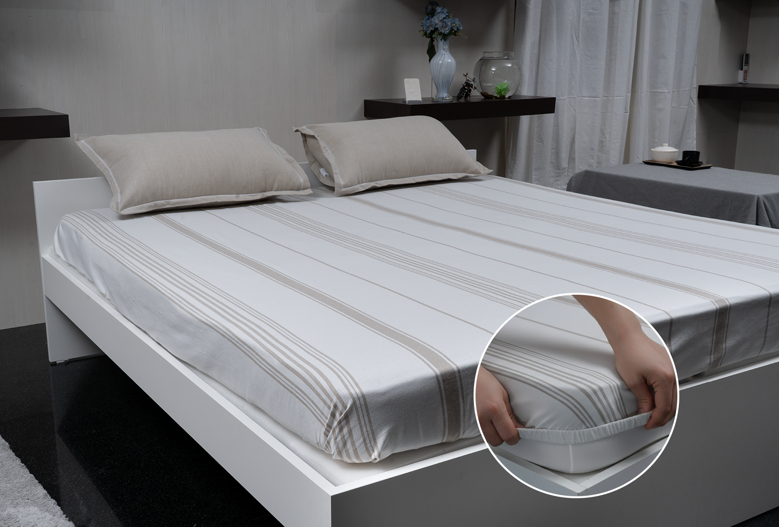 Linn Decors fitted sheet with elastic edges on a modern bed in a clean bedroom setting