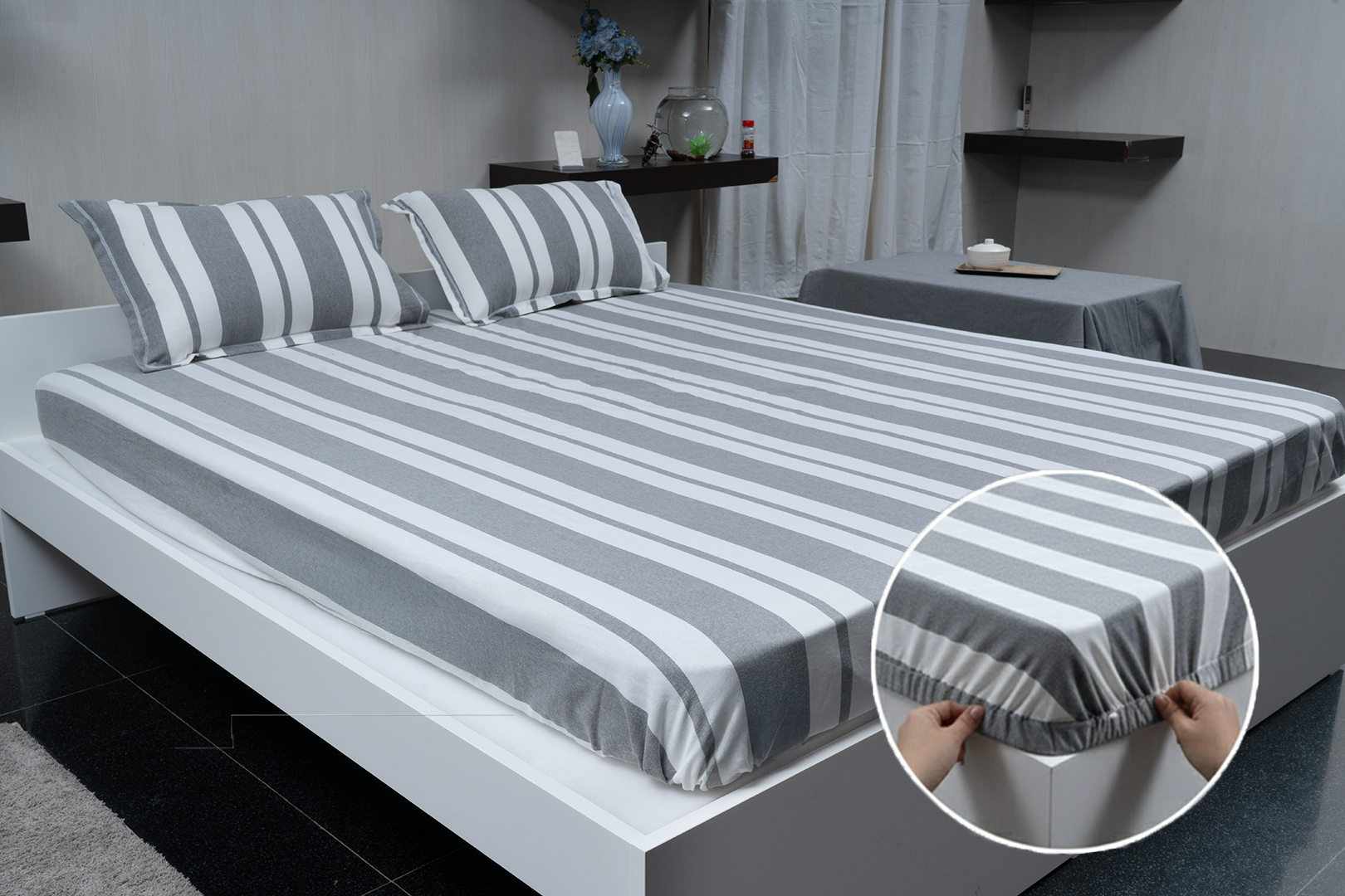 Linn Decors fitted sheet with elastic edges on a modern bed in a clean bedroom setting