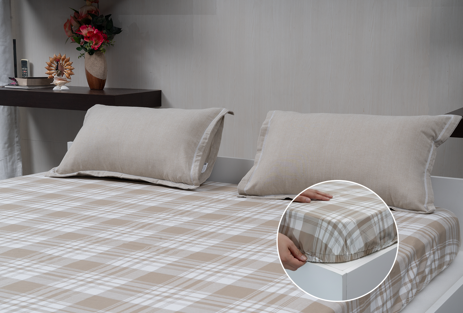 Linn Decors fitted sheet with elastic edges on a modern bed in a clean bedroom setting
