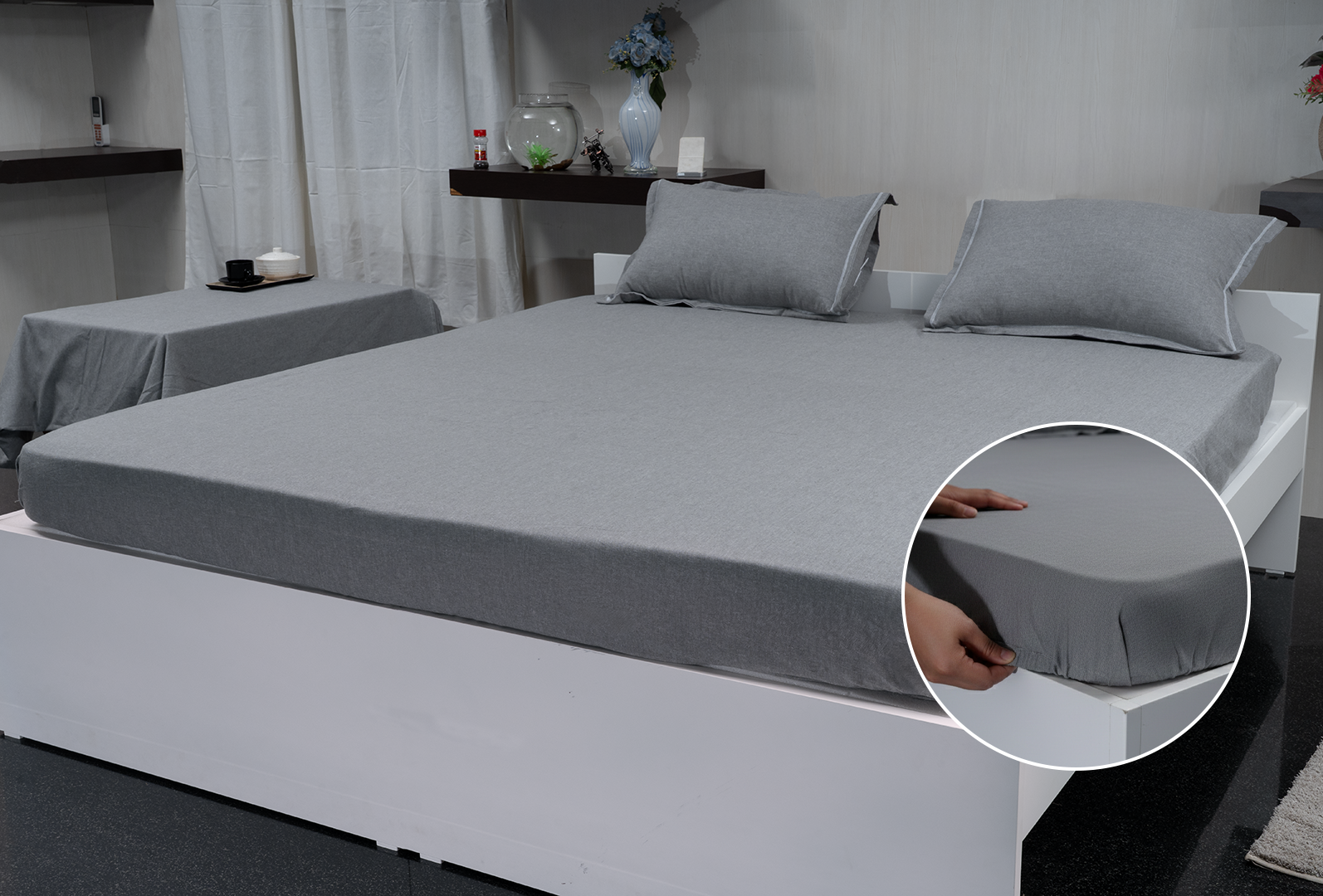 Linn Decors fitted sheet with elastic edges on a modern bed in a clean bedroom setting