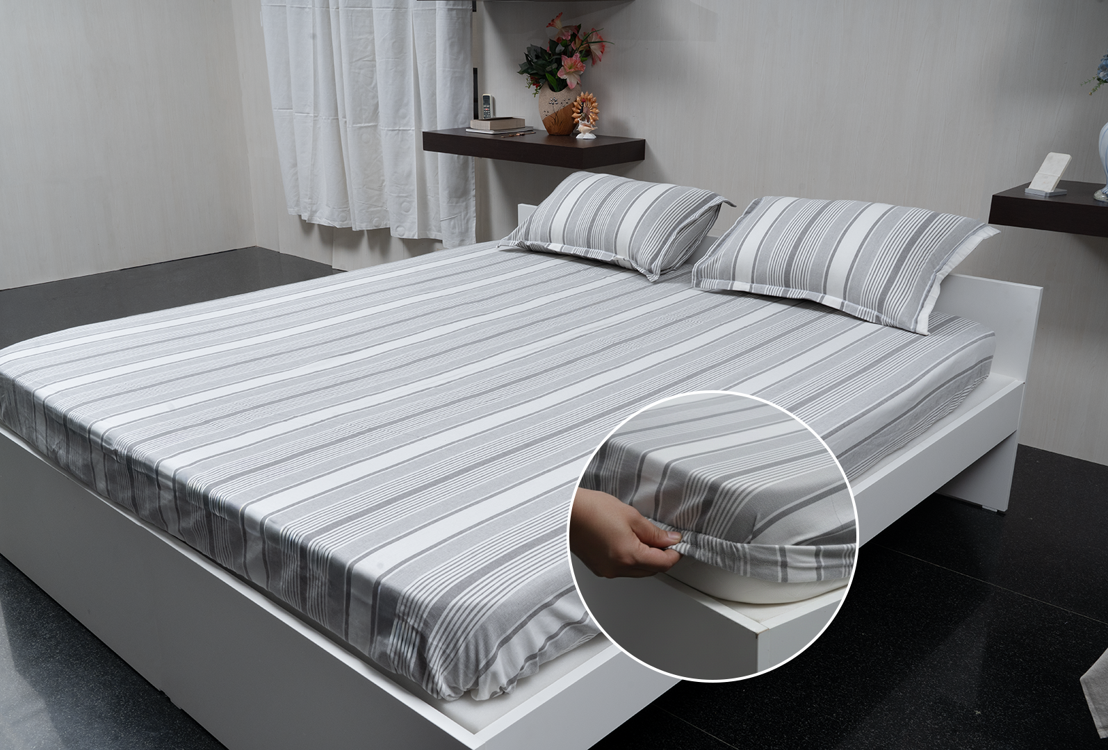 Linn Decors fitted sheet with elastic edges on a modern bed in a clean bedroom setting