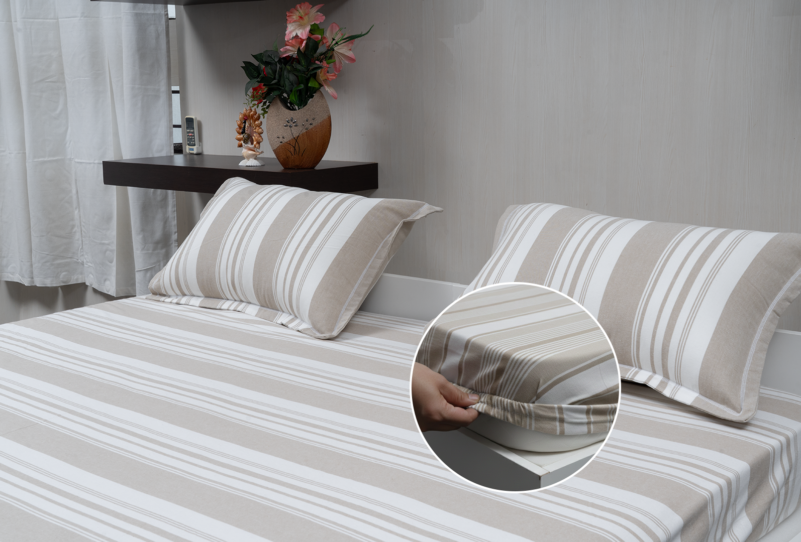 Linn Decors fitted sheet with elastic edges on a modern bed in a clean bedroom setting
