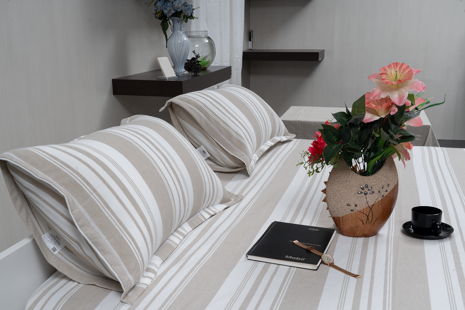 Linn Decors fitted sheet with two pillow covers and quilt styled on a modern bedroom bed