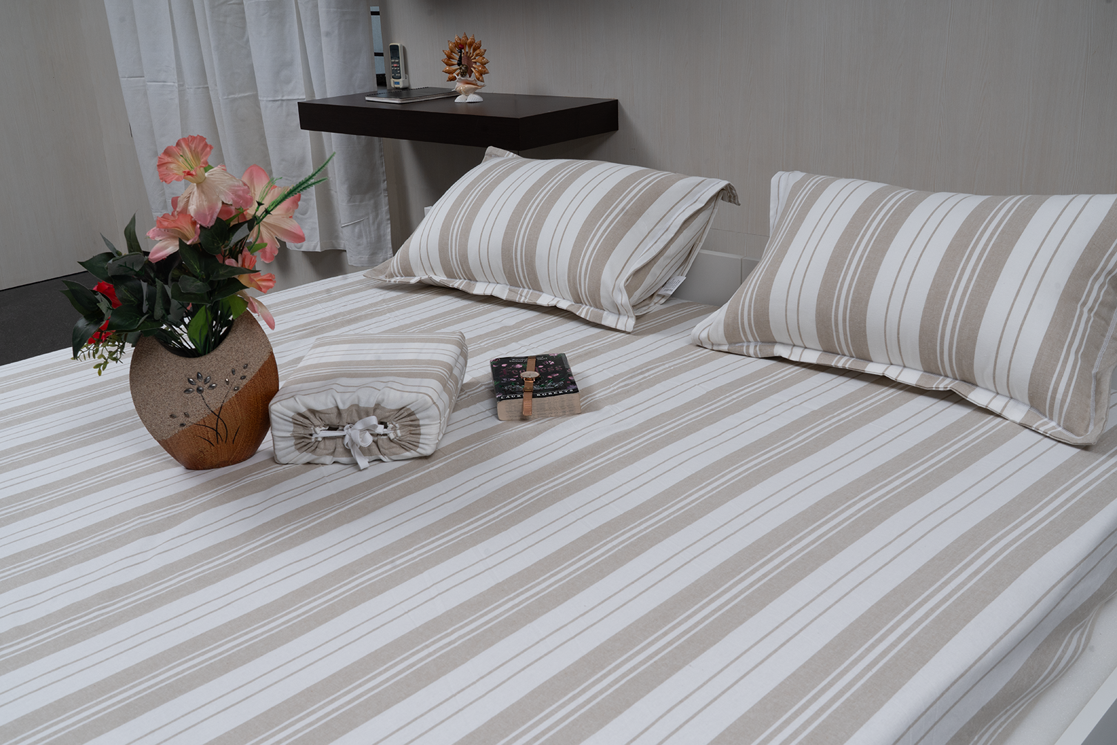 Linn Decors fitted sheet with two pillow covers and duvet cover styled on a modern bedroom bed